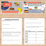 Educational materials on a wooden surface, including a map of Africa and worksheets.