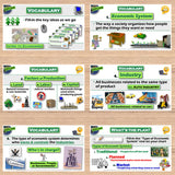 Educational posters on economics and vocabulary on a wooden surface