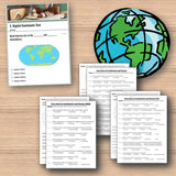 Educational materials including a test paper, globe, and worksheets on a wooden surface